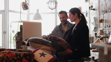 Couple shopping in a home interior store