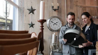 Couple shopping in vintage antique store