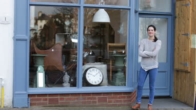 Portrait of small business owner outside store