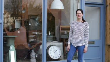 Portrait of small business owner outside store
