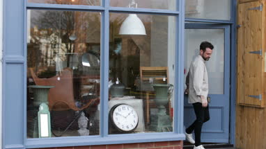 Portrait of small business owner outside store