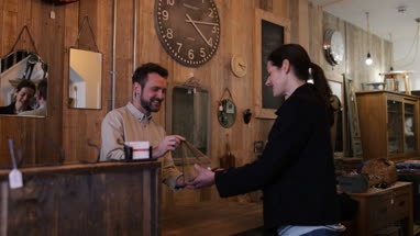Customer paying with credit card in a home store