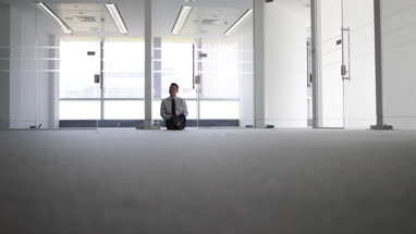 Businessman planning in new office space