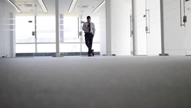 Businessman planning in new office space