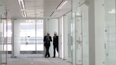 Businessman looking at new office space