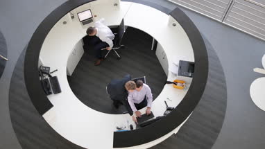 Overhead shot of people working in an office