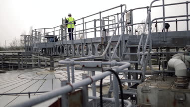 Industrial worker using a digital tablet on site