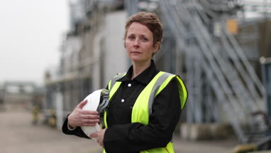 Female industrial worker on site