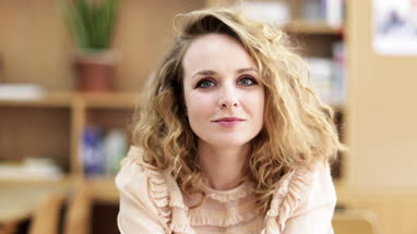 Portrait of young adult female looking to camera