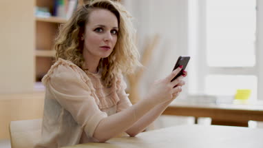 Student using smartphone in class
