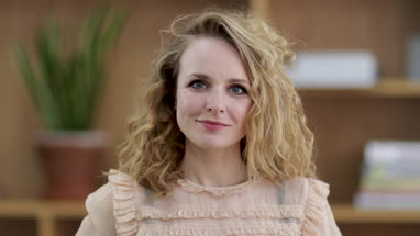 Portrait of young adult female looking to camera