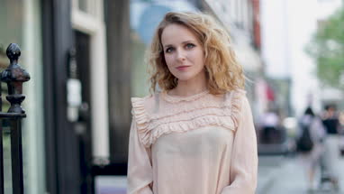 Portrait of adult female outdoors in city