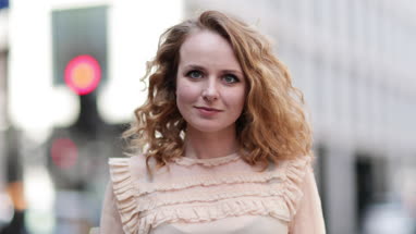 Portrait of adult female outdoors in city