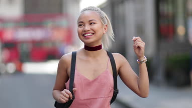 Portrait of young adult female looking to camera