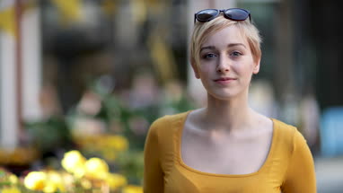 Portrait of young adult female looking to camera