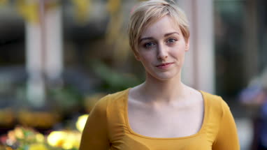 Portrait of young adult female looking to camera