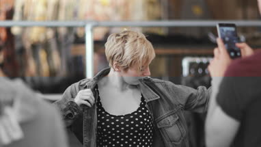 Millennial couple in a vintage clothing store