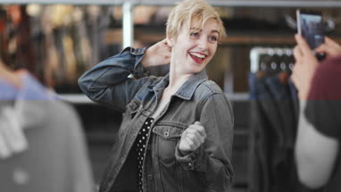 Millennial couple in a vintage clothing store