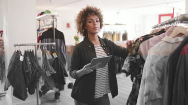 Portrait of a store manager in clothing store