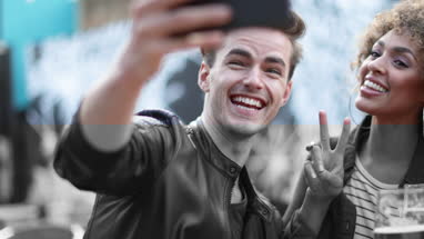 Friends socialising outdoors in summer