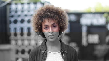 Portrait of Millennial female outdoors