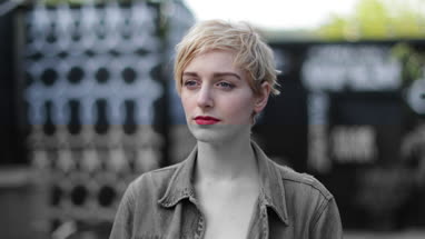 Portrait of Millennial female outdoors