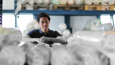 Portrait of male employee in distribution warehouse