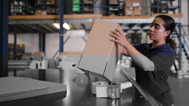 Female working in packing warehouse