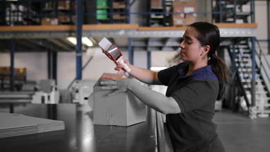 Female working in packing warehouse