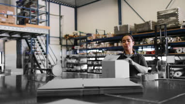 Female working in packing warehouse