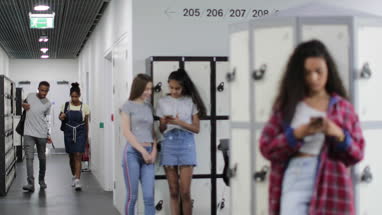 Students in high school corridor