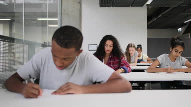 African American student in high school exam