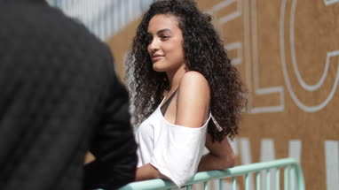 Teenagers socialising outdoors in city