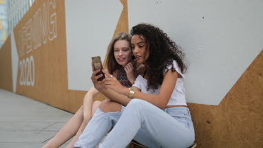 Female teenage friends taking a selfie