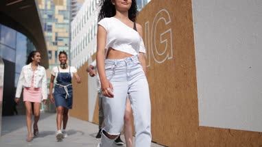 Group of teenagers walking through city