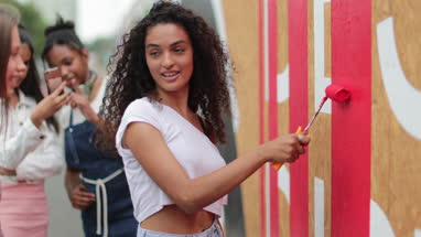 Group of teenagers working together on a community project