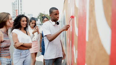 Group of teenagers working together on a community project