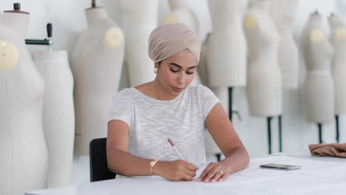 Portrait of muslim female student fashion designer