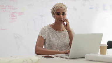 Portrait of Muslim businesswoman in an office