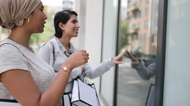 Muslim friends window shopping