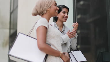 Muslim friends window shopping