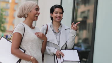 Muslim friends window shopping