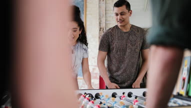 Friends winning table football