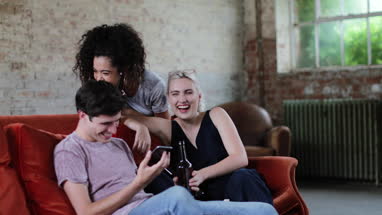 Roomates having a beer together