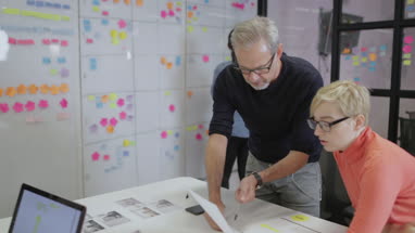 Coworkers working late in an office