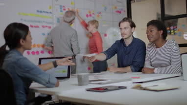 Coworkers in a late meeting