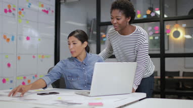 Coworkers in a late meeting