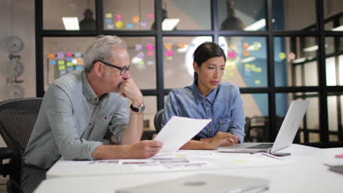 Coworkers in a late meeting