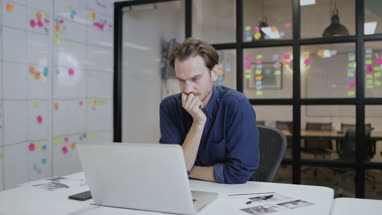 Adult male working late in an office