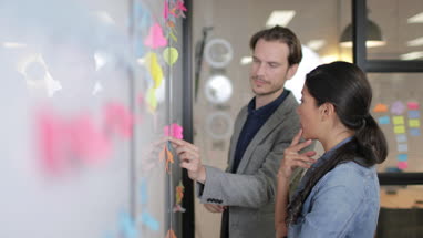 Coworkers brainstorming in an office